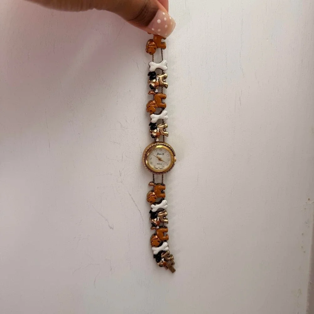 GOLD TONE JENNIE B DOG CHARM WATCH